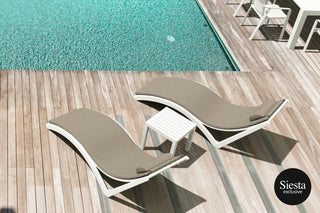 Resort style living with pool chairs